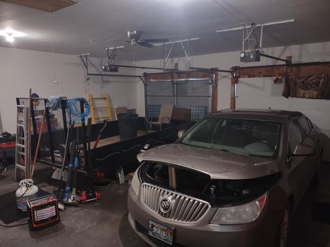 Large insulated attached garage | Image 52