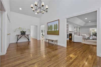 Spacious foyer offers views of the large living room and the open concept family room. | Image 3