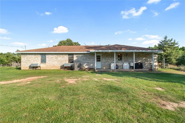 Back of house featuring brick siding | Image 32