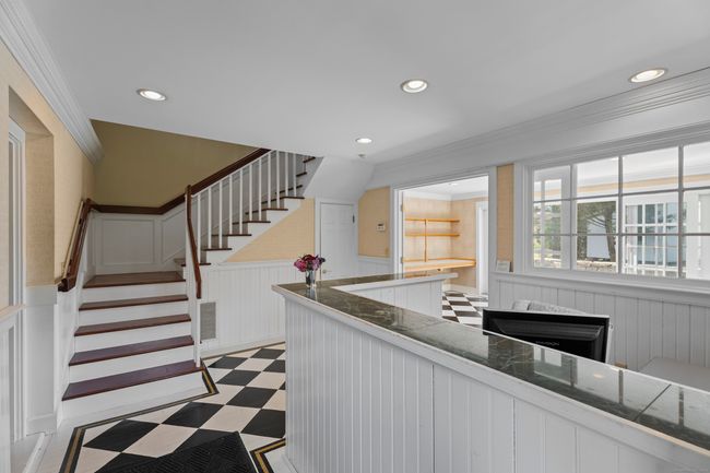 Stairs leading to the landing and upper level. | Image 20