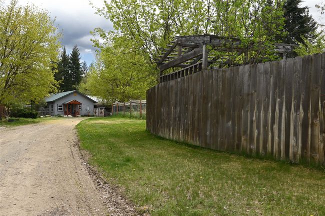 View of yard featuring driveway | Image 79