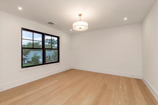 Spare room with light wood-style floors and recessed lighting | Image 14
