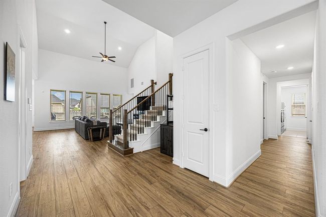 Laundry room located down the hall. | Image 14