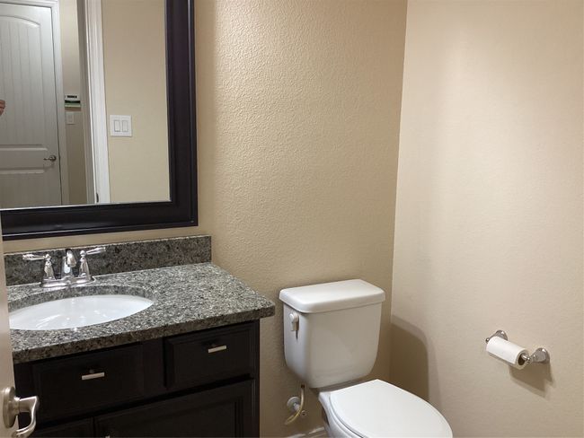 Bathroom with toilet and vanity | Image 20