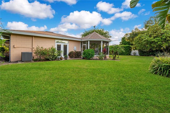Rear yard with screened and covered gazebo | Image 39