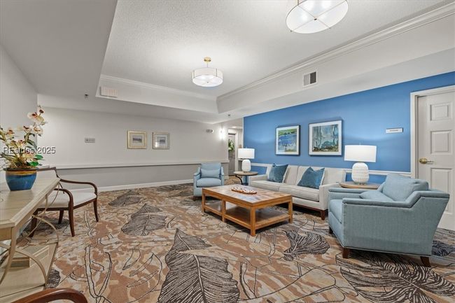 As 3309 TidePointe is located on the third floor. This is the lobby outside of the elevators. What a nice place to chat with neighbors and friends! | Image 32