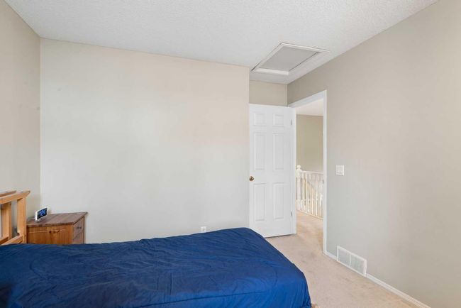 219 Coachway Lane Sw, Townhouse with 3 bedrooms, 3 bathrooms and 2 parking in Calgary AB | Image 26