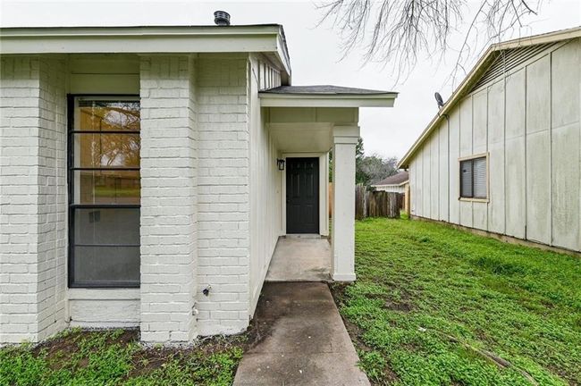 Entrance to property featuring brick siding | Image 20