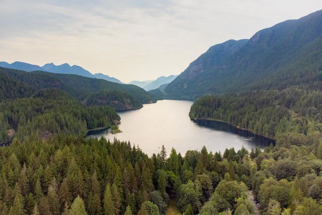 Property view of water featuring a mountain view and a wooded view | Image 35