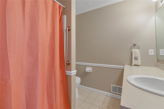 Another view of the design of the master bath. | Image 14