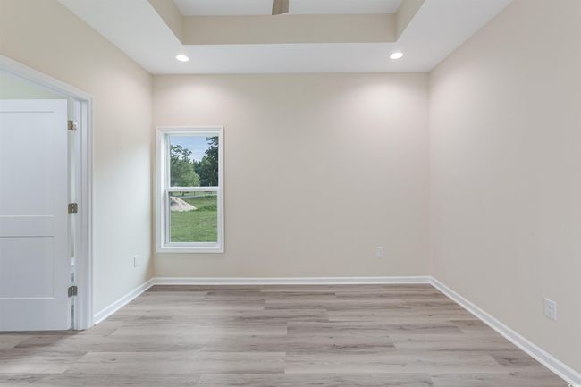 Spare room featuring recessed lighting, light wood-style flooring, and baseboards | Image 17
