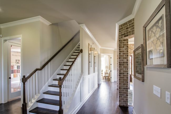 All wood staircase leading to the upstairs. | Image 15