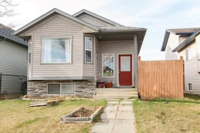 8846 69 Avenue, Home with 3 bedrooms, 2 bathrooms and 2 parking in Grande Prairie AB | Image 1