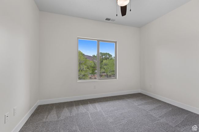 Spare room with baseboards, visible vents, ceiling fan, and carpet flooring | Image 20