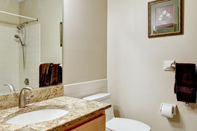 Updated main bath with Cambria vanity | Image 13