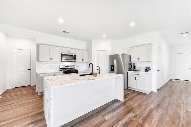24222 Sandstone Valley Ln, House other with 5 bedrooms, 3 bathrooms and 2 parking in Spring TX | Image 9
