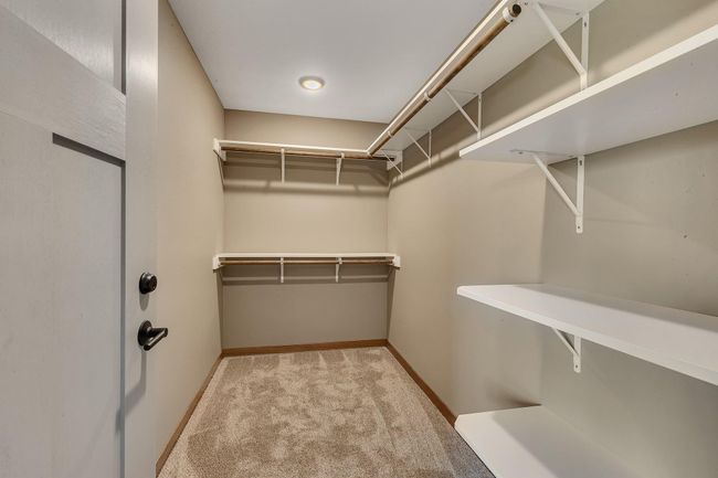 Primary bedroom Walk in closet duals a safe room | Image 11