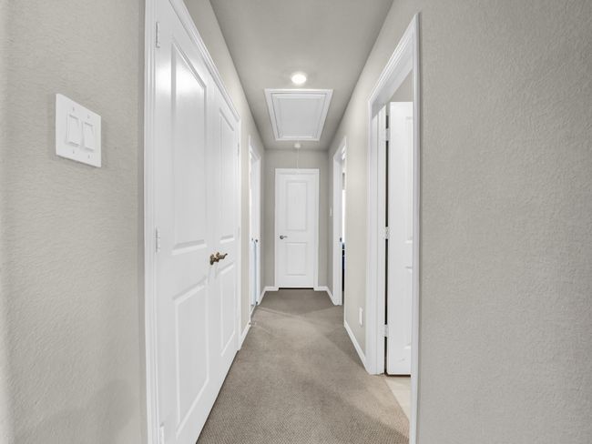 Hallway that separates 3 Bedrooms | Image 27