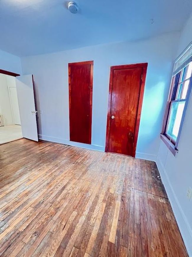 Unfurnished room with light hardwood floors | Image 4