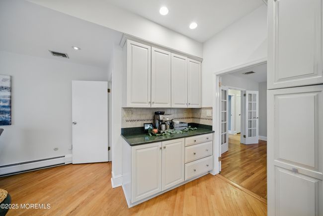 Eat in Kitchen with separate Dining, Coffee bar, SS appliances with sliders to LARGE deck with privacy and nature. | Image 10
