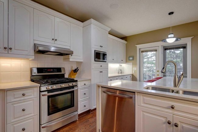 23 Prominence Point Sw, Home with 2 bedrooms, 2 bathrooms and 4 parking in Calgary AB | Image 4