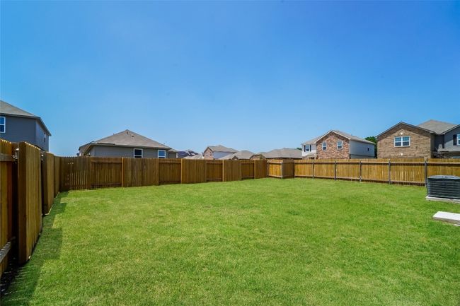 Fenced backyard featuring a residential view | Image 20