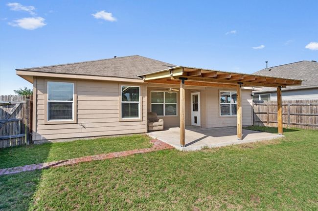 Rear view of house featuring a patio area | Image 28