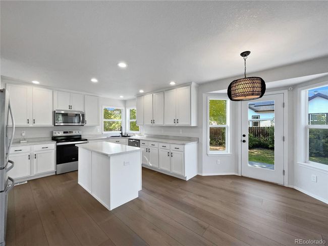 545 Short Dr, House other with 5 bedrooms, 4 bathrooms and 3 parking in Dacono CO | Image 6