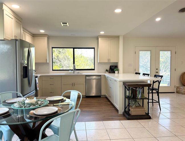 Custom cabinets feature soft-close hardware and pull out drawers | Image 8