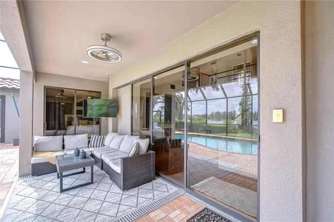 Relax after a long day in the pool on your covered lanai! | Image 35