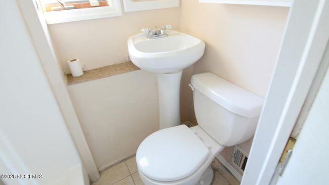 First Level Bathroom with Shower. | Image 30