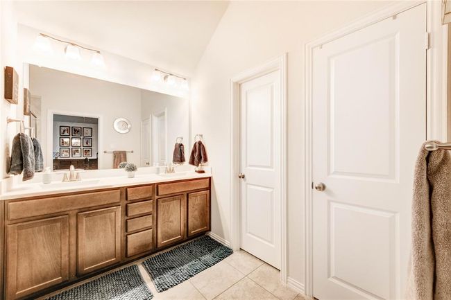 Primary bathroom with two sinks and large walk-in shower | Image 25