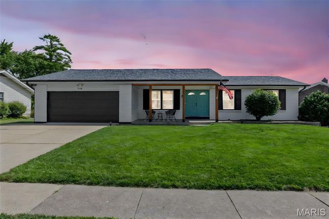 Single story home with an attached garage, a front yard, driveway, covered porch, and roof with shingles | Image 5