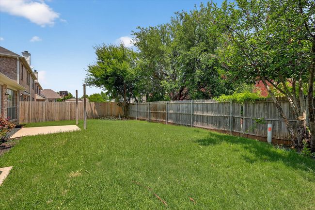 Fenced backyard featuring a patio area | Image 18