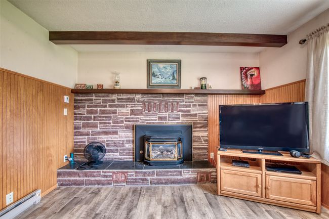 Second living room featuring a gas fireplace | Image 35