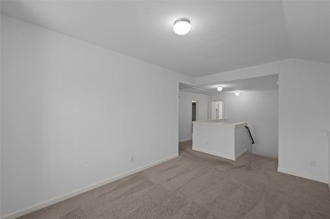 Carpeted spare room featuring baseboards | Image 29