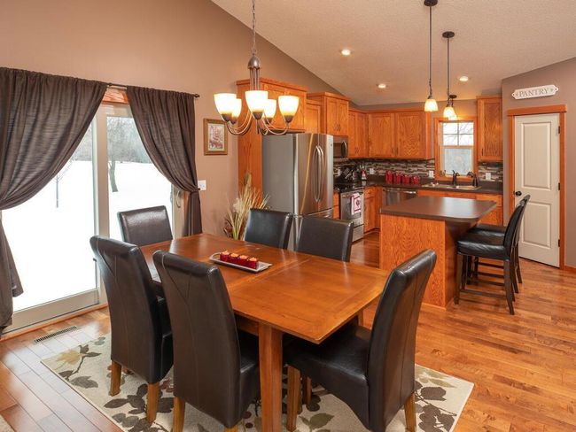Gather in dining area with family and friends | Image 21