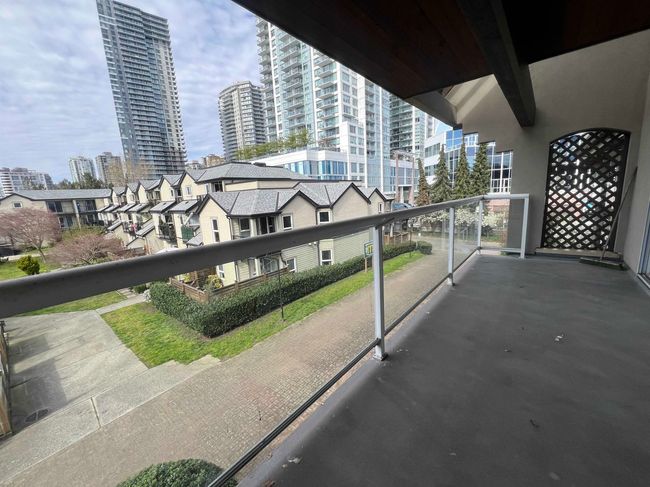 Balcony with a view of city | Image 34