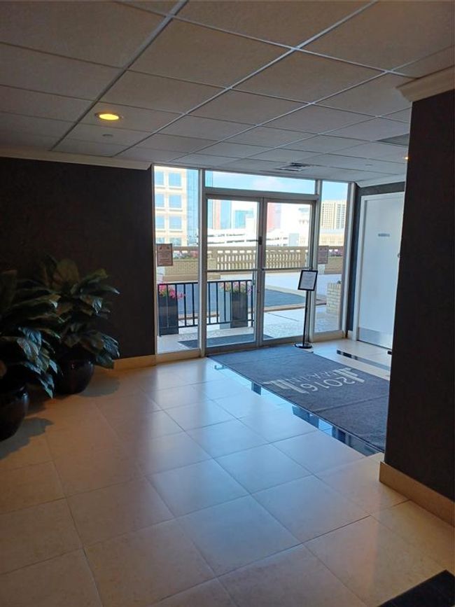 View out of the doors to what will soon be the beautifully renovated deck | Image 29