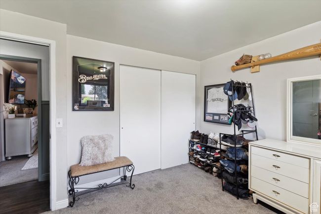 Sitting room featuring carpet floors | Image 18