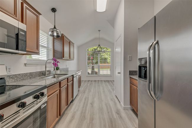 New stainless appliances, granite countertops, new sink and faucet | Image 11