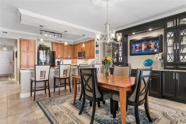 Dining with lots of Built in cabinetry | Image 16