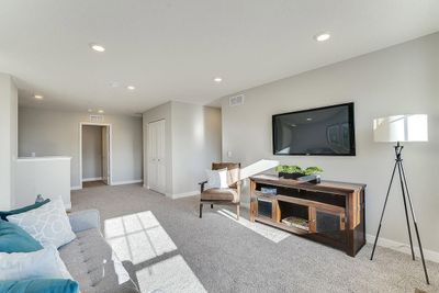 A second view from the game room - which is conveniently surrounded by the home's four upper level bedrooms and has easy access to the laundry room! Photo of model home, color and options will vary. | Image 3