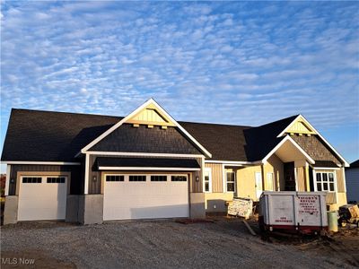 View of front of home featuring a garage | Image 1