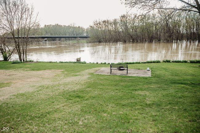 surrounding community featuring a yard and a water view | Image 4
