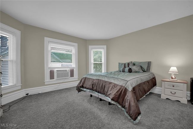 Bedroom with carpet | Image 15