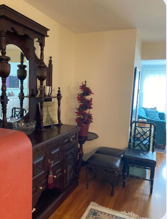 Doorway to outside featuring carpet flooring and baseboards | Image 27