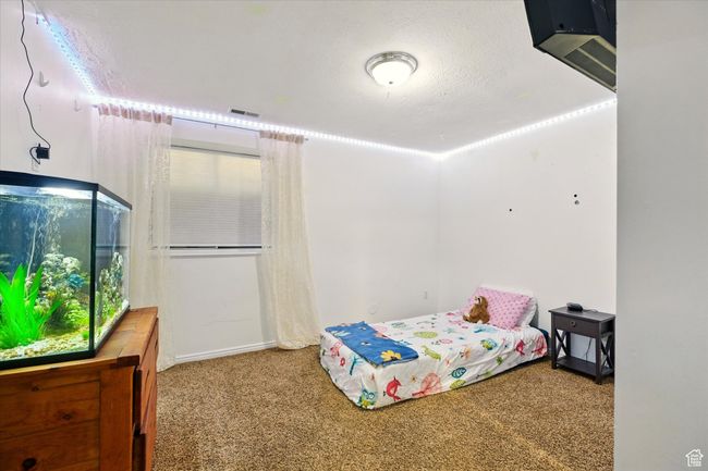 View of carpeted bedroom | Image 19