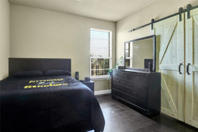 Secondary bedroom with jack and jill bath. | Image 22