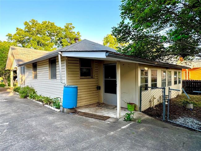 Back door to add on back porch | Image 34